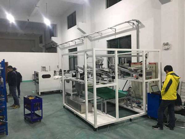 自动化枕头缝制充绒缝口真空包装设备